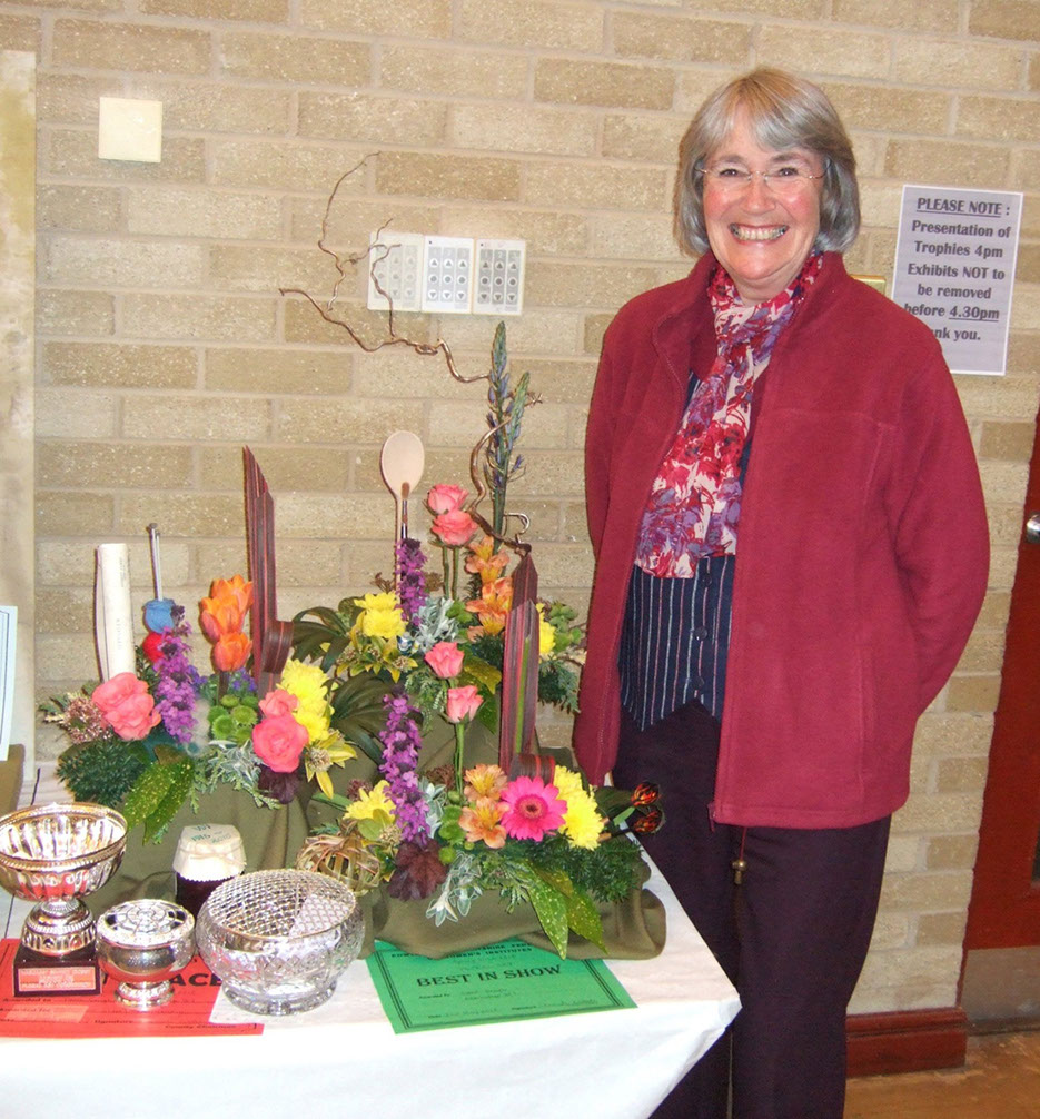 Carol Gough winning flower display at W.I. 2015 Spring Fair in Carno.